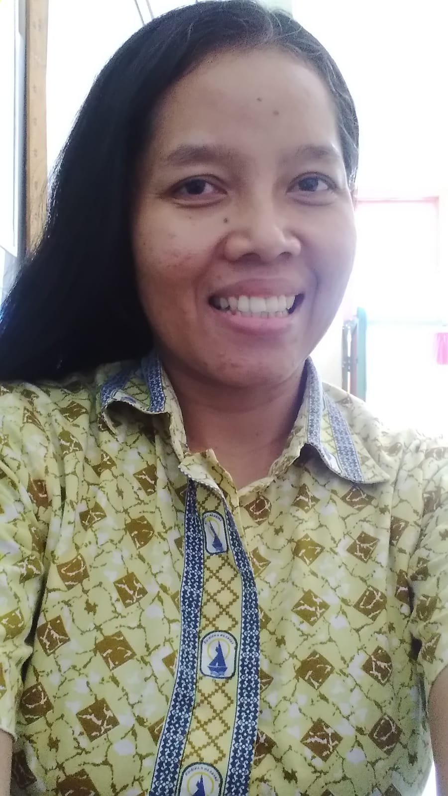 Theresia Murni, S.Pd
